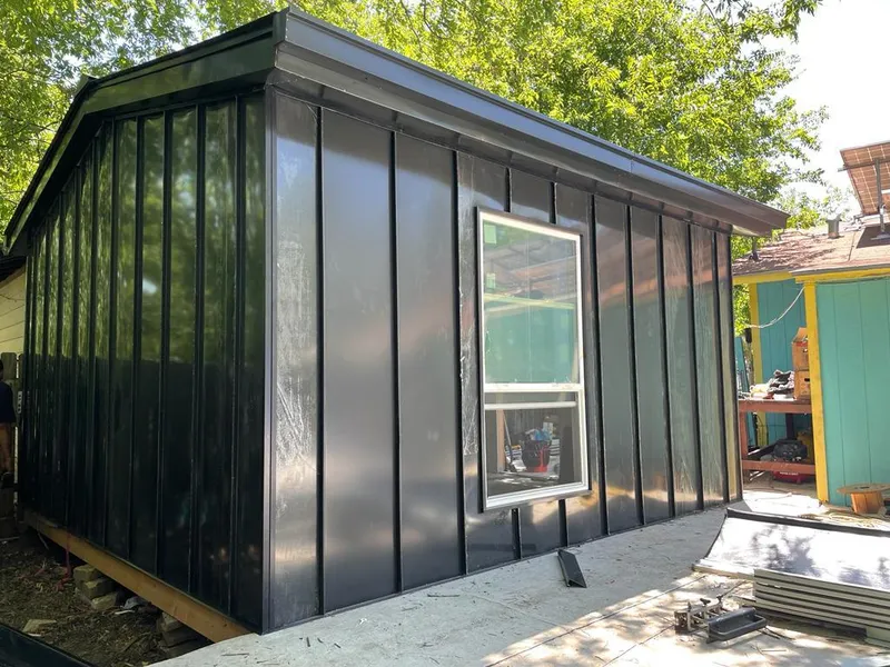 Black standing seam metal wall panels for Roof Inspection in Palestine