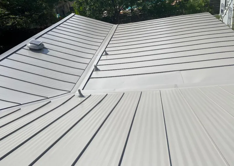 Solar attic fan installed on a metal roof for Roof Ventilation in Palestine